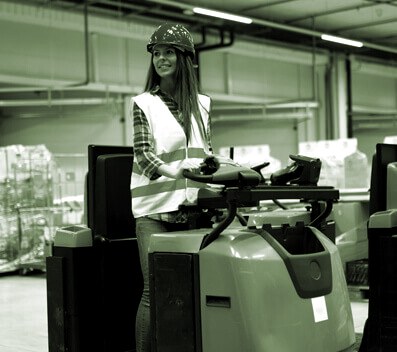 Logistics operator using warehouse equipment